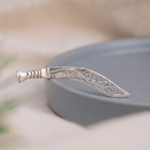 Khukuri brooch