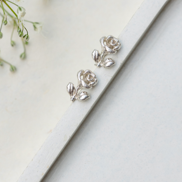 Rose with leaf studs